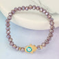 Twinkling Eye Lavender Bead Stretch Bracelet